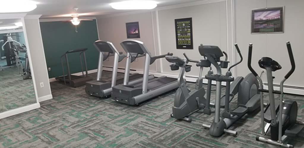 A gym with exercise equipment at Bromley House apartments for rent